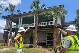 The Dave Patton House during its restoration, with scaffolding around the historic masonry